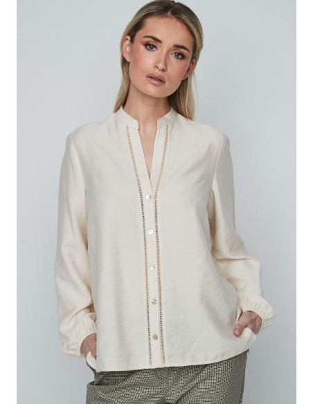 Blusa entredós crudo